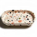 Terras ovaal decoratief schaal van terrazzo 25 x 15 x 5cm beige met kleurnuances